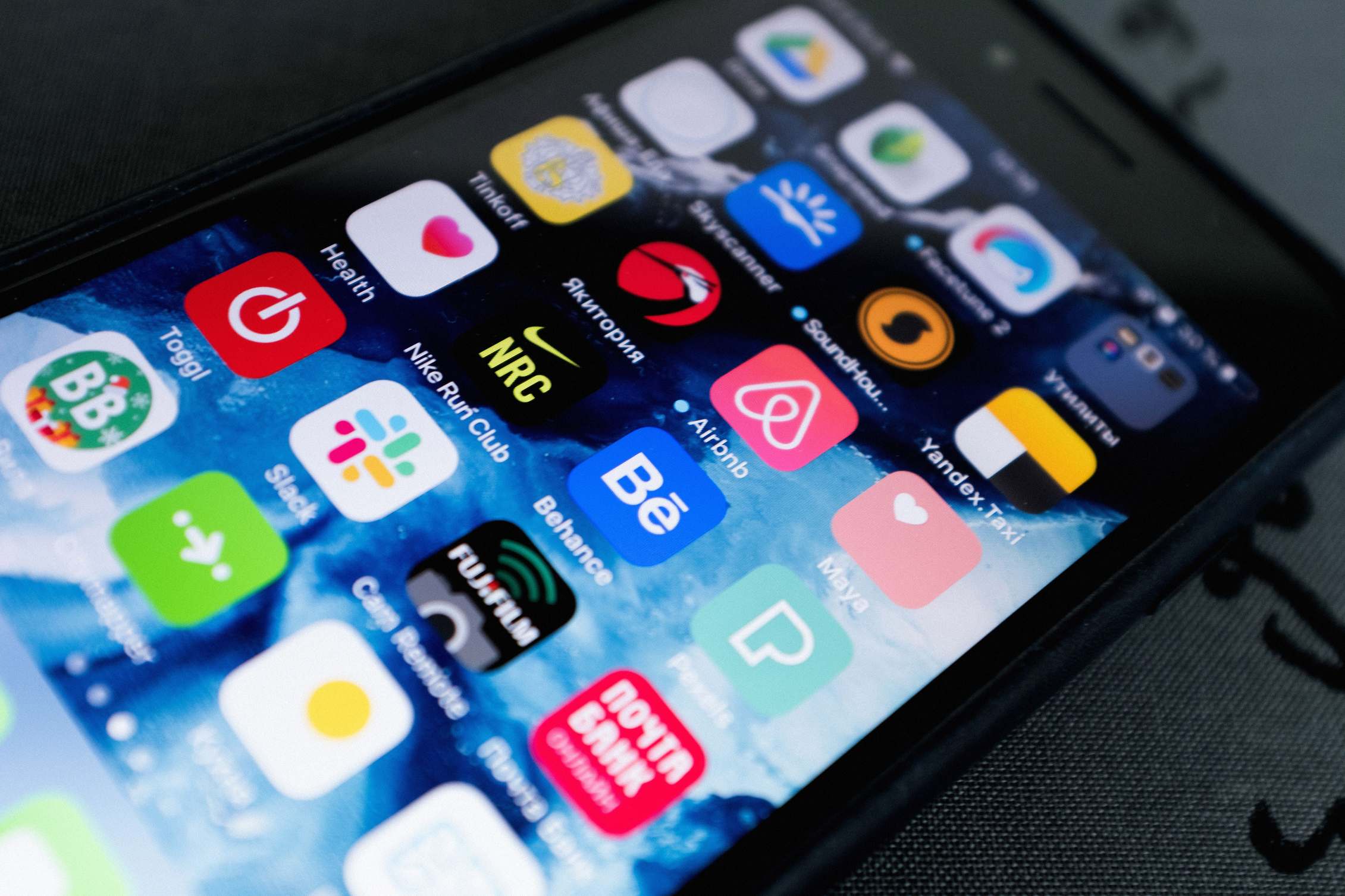 Smartphone with an app screen showing an email app icon